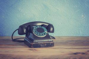 Vintage phone on a wooden table